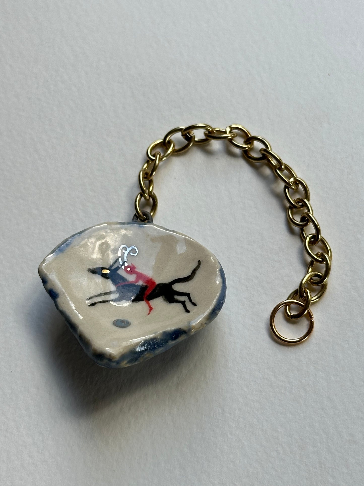 Pearl Hunter - Shell Charm