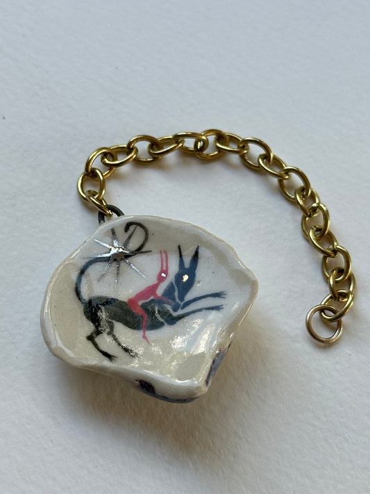 Ambiguous Reality - Shell Charm